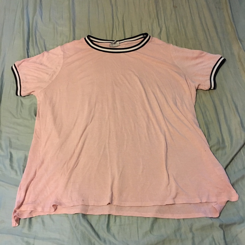 Pink shirt with black and white trim